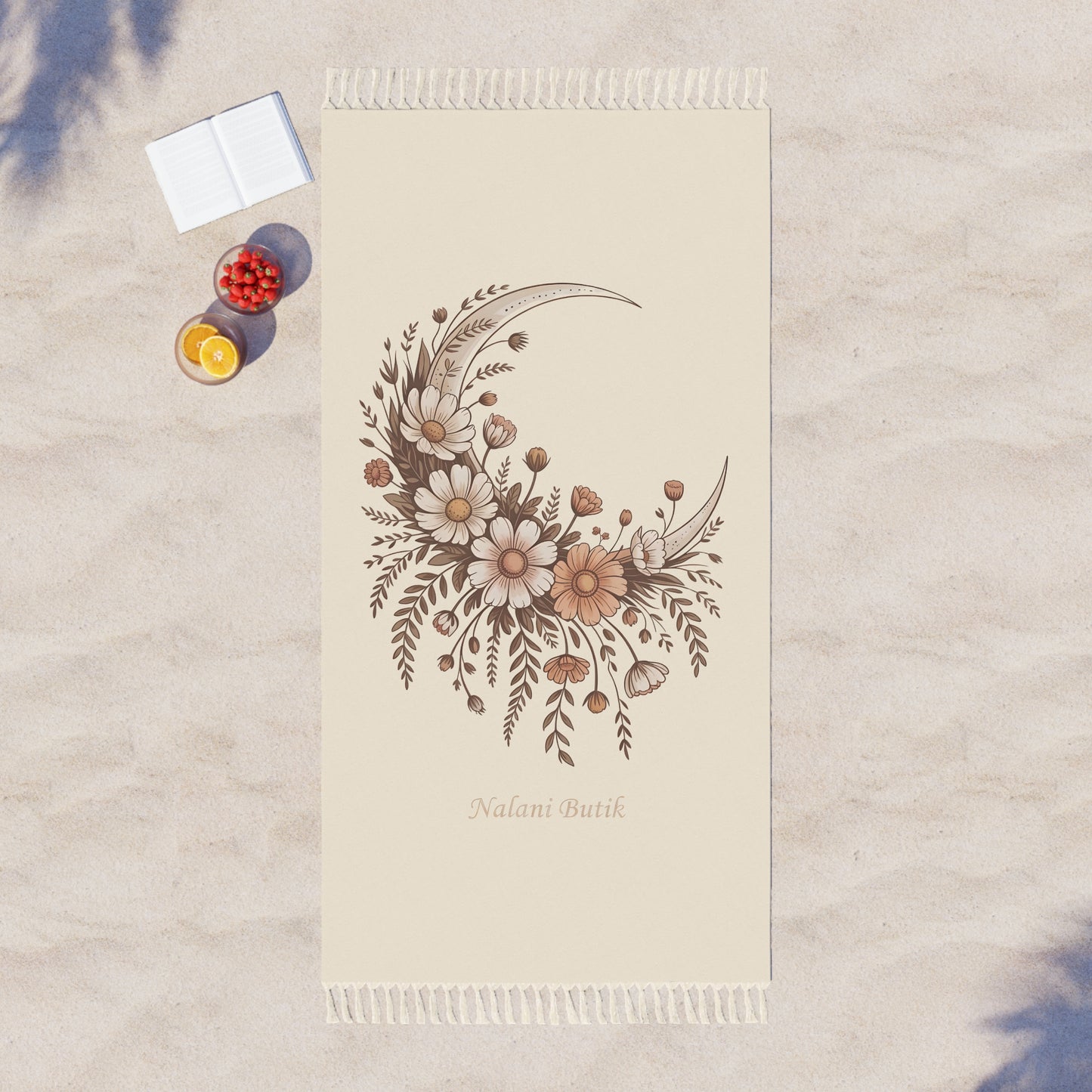 Towel with floral design and text on a textured surface