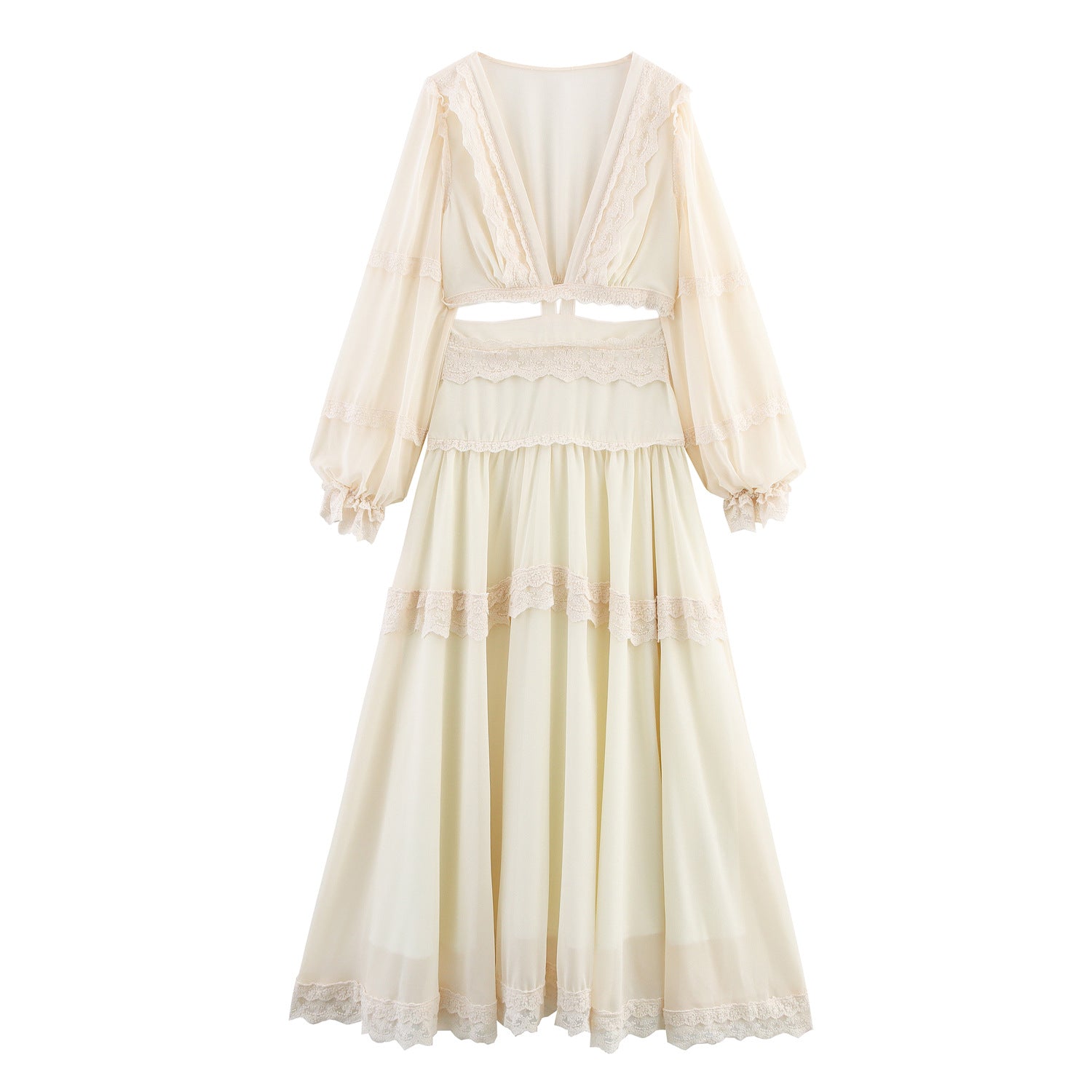 Cream-colored dress with long sleeves and a layered skirt on a white background