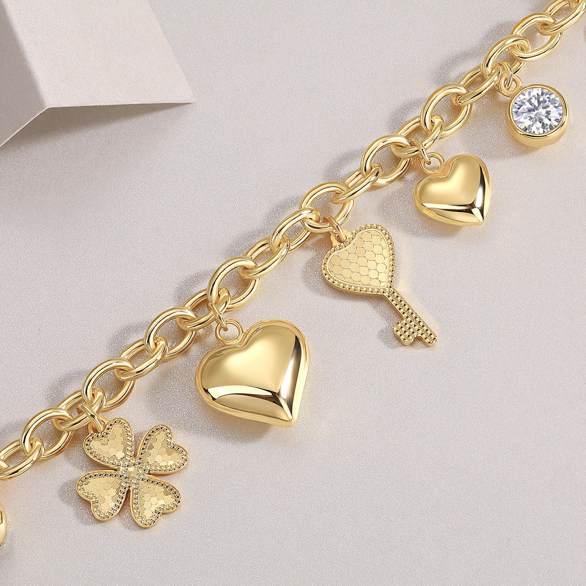 Gold Charm Link Bracelet with Moissanite Accents – Playful & Elegant