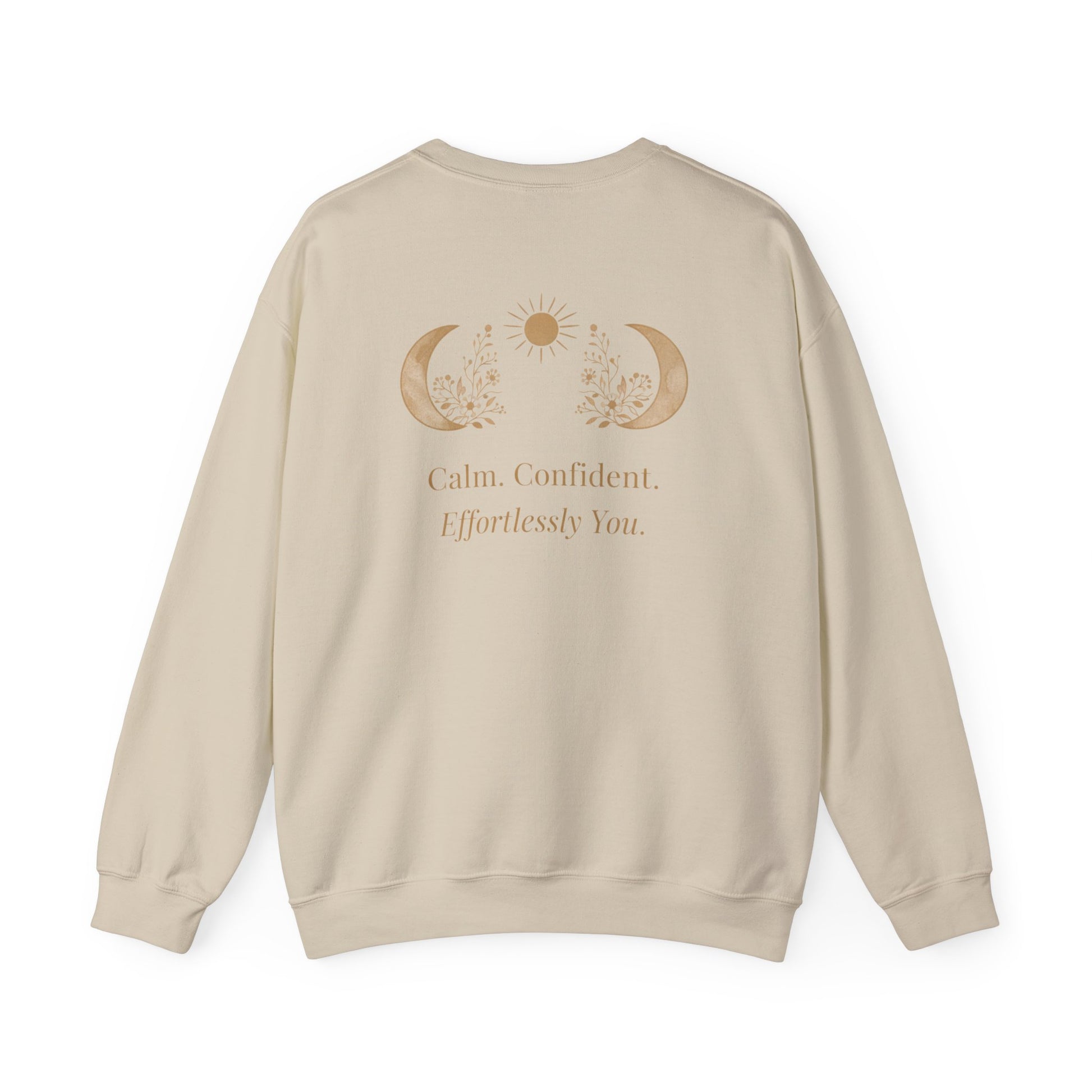 Beige sweatshirt with celestial design and text on a white background