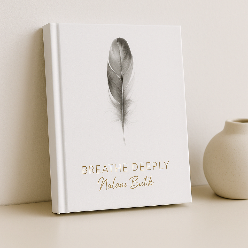 Book titled 'Breathe Deeply Nalani Butik' with a feather illustration on a white background