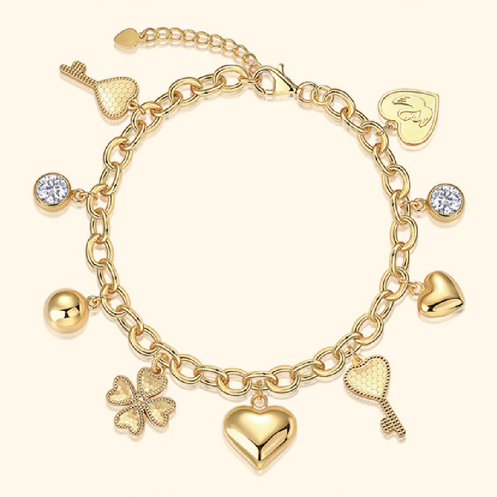 Gold Charm Link Bracelet with Moissanite Accents – Playful & Elegant