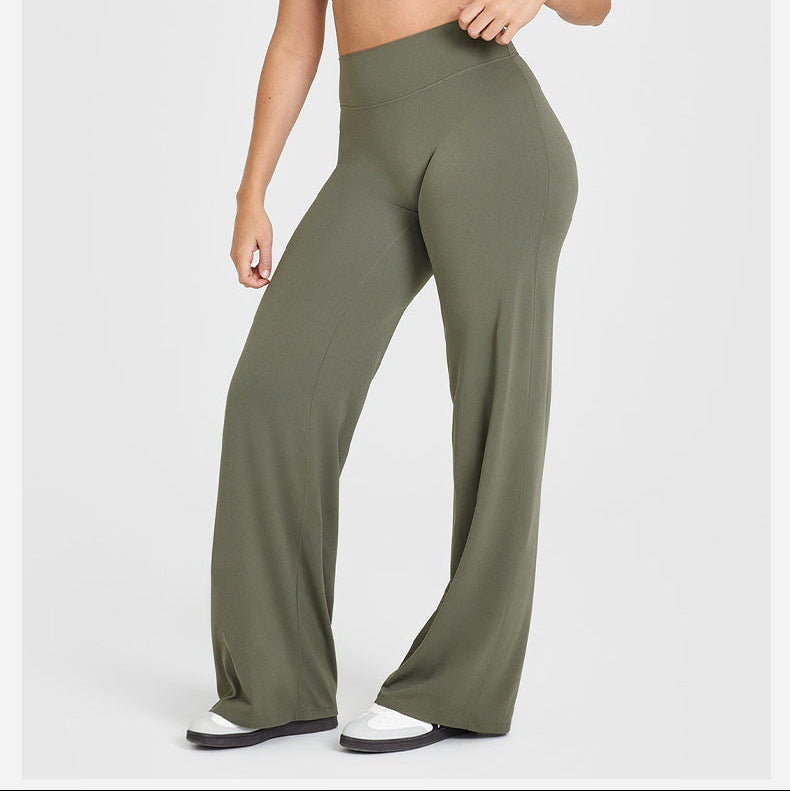 Person wearing a green athletic outfit on a white background