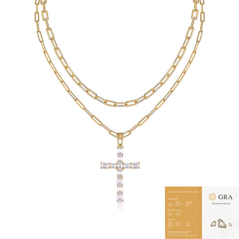Gold chain necklace with a cross pendant on a white background, featuring a GRA certification card.