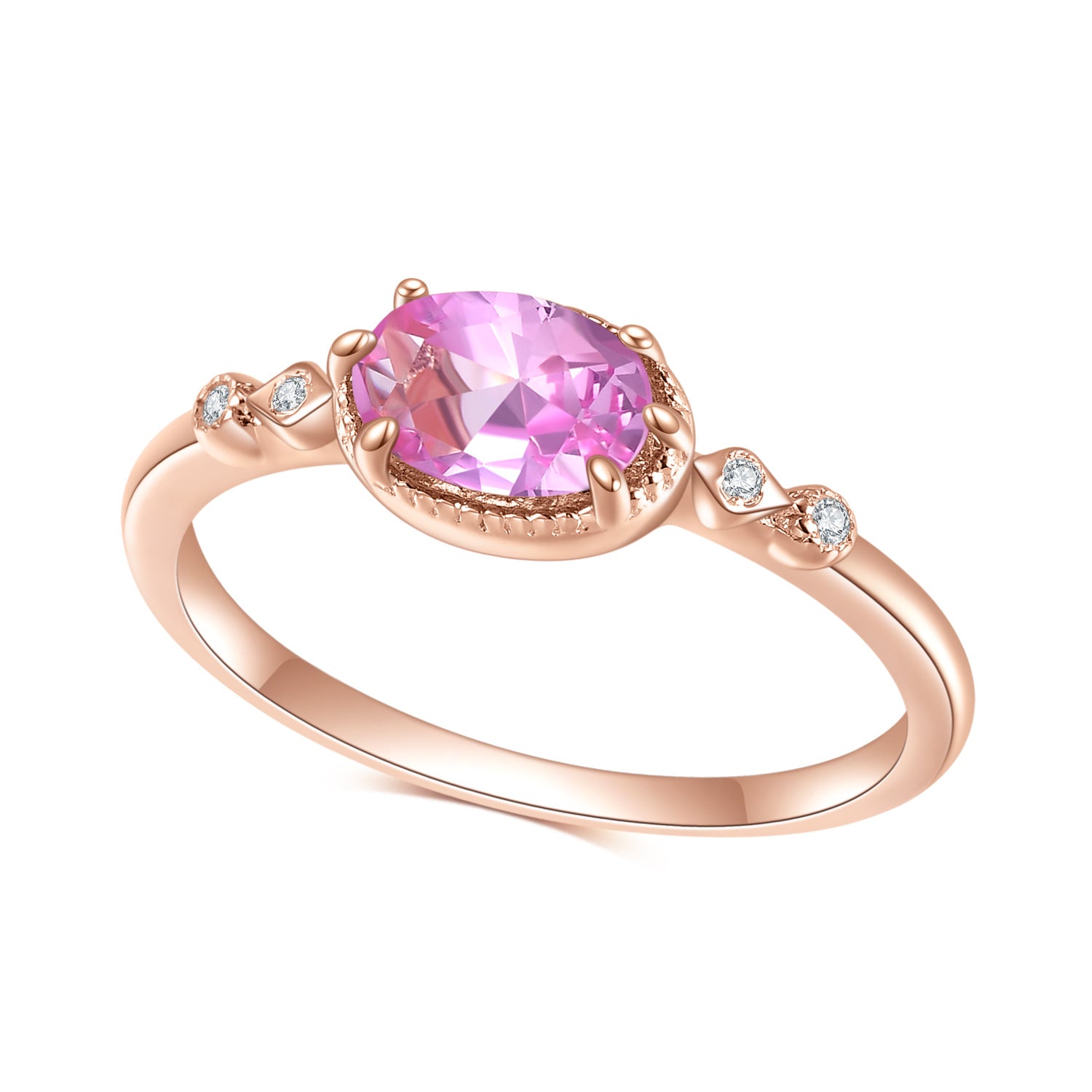 Rose gold ring with a pink gemstone on a white background