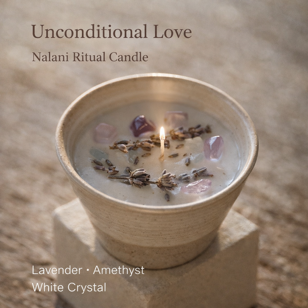 Nalani Ritual Candle labeled 'Unconditional Love' with lavender, amethyst, and white crystal ingredients on a neutral background.